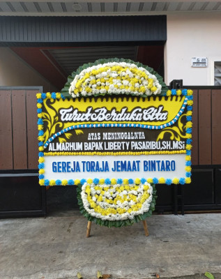 Papan Bunga Duka di Pulutan